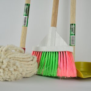cleaning tools including mop, broom, and dustpan