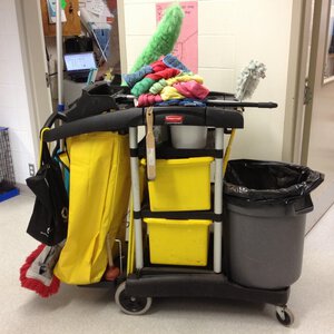 janitorial cart with cleaning supplies