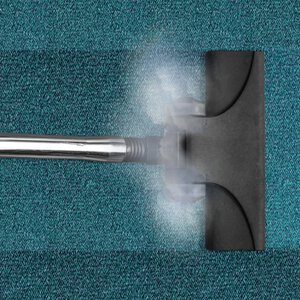 carpet being steam cleaned by machine